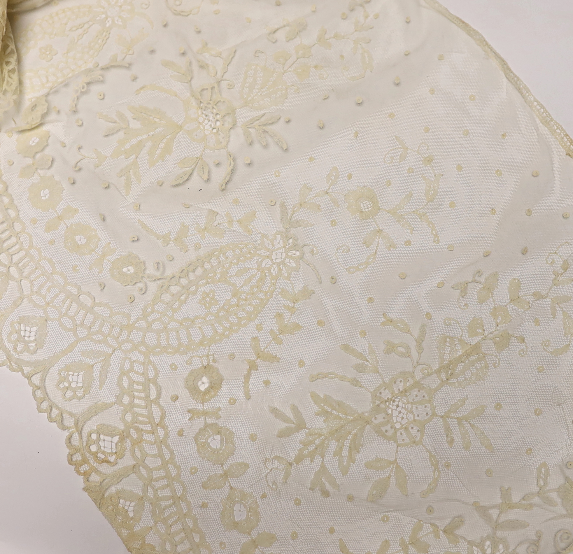 Late 19th century bobbin lace trimming: a length of mixed Brussels bobbin and needle lace trim, 255cm x 30cm and another length in the same design 126cm x 30cm together with a Honiton bobbin lace length 460cm x 50cm and